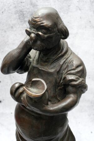 Sehr dekorative Bronze eines Schusters bei der Arbeit. Hinten an der Plinthe signiert "P. Karge Köln a/Rh(ein").