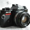 Olympus OM-4 Ti | black | mit Zuiko 1,8 / 50 mm