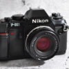 Nikon F-301 | mit Nikkor 50 mm / 1.8 | Top Zustand | die kleine motorische von Nikon
